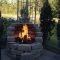 Relaxing Outdoor Fireplace Designs For Your Garden27